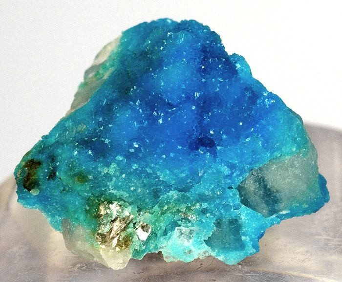 Sky-blue turquoise microcrystals covering a rock matrix