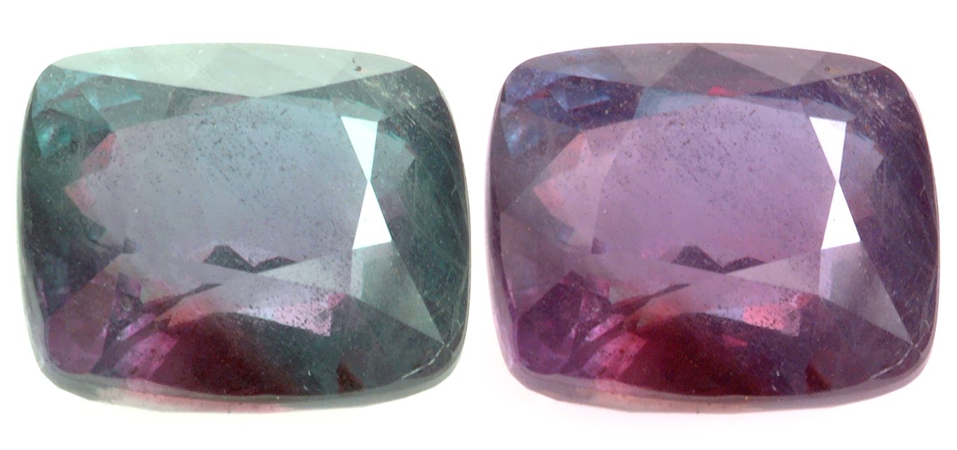 The same 26.75-carat alexandrite gemstone photographed twice, appearing bluish-green in daylight on the left and purplish-red under incandescent light on the right