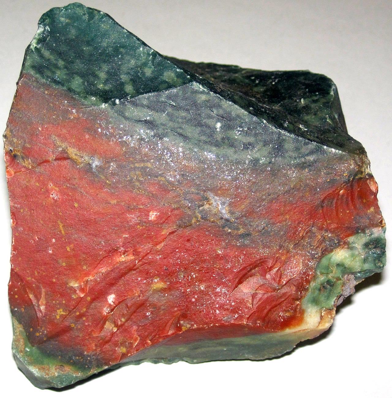 Polished bloodstone specimen showing dark green chalcedony with red iron-oxide spots